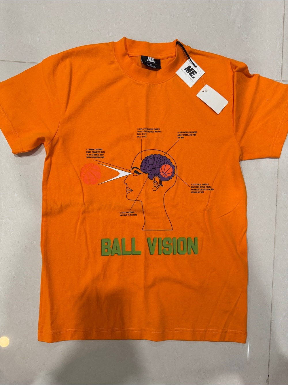 ME Makeover Essentials Orange 'Ball Vision' Graphic Tee
